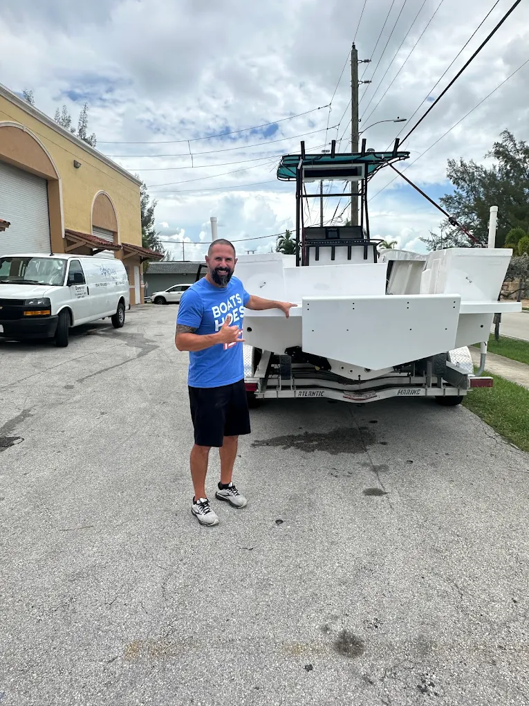 Satisfied customer with custom transom bracket installation at Point Marine Corp